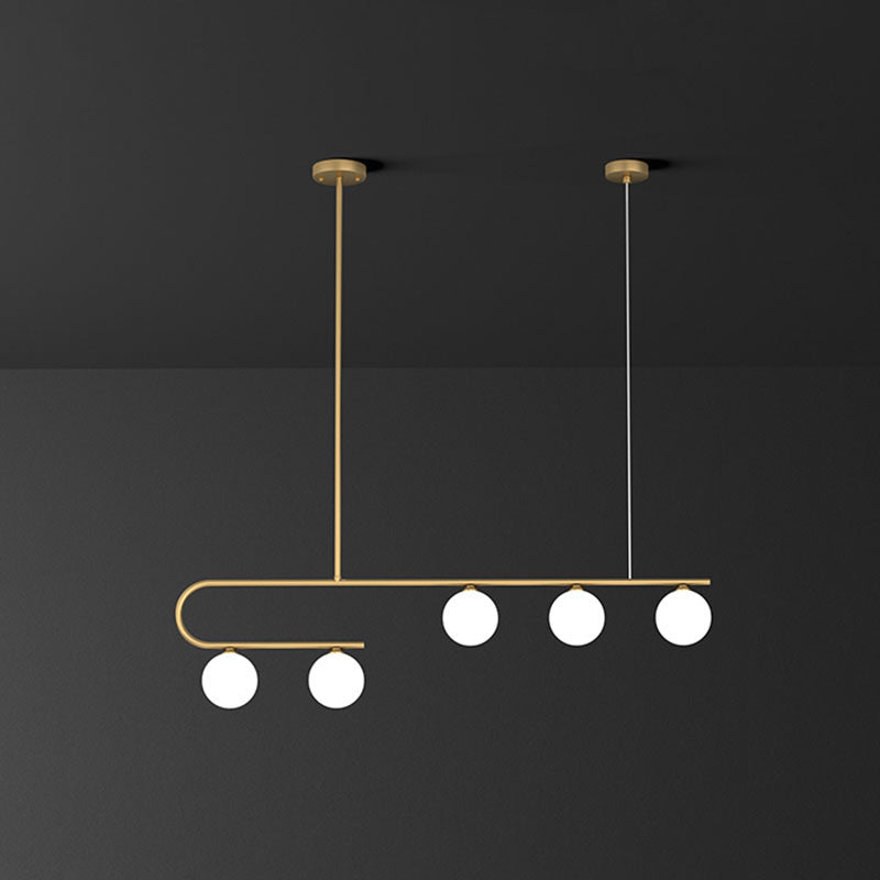 Linear Restaurant Island Pendant Light Ivory Ball Glass Postmodern LED Hanging Lamp in Gold 5 Gold Clearhalo 'Ceiling Lights' 'Island Lights' Lighting' 2265839