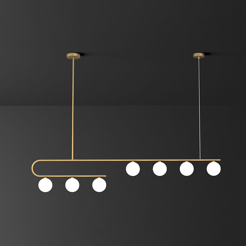 Linear Restaurant Island Pendant Light Ivory Ball Glass Postmodern LED Hanging Lamp in Gold 7 Gold Clearhalo 'Ceiling Lights' 'Island Lights' Lighting' 2265841