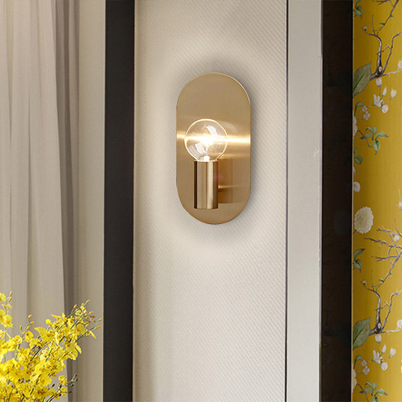 Exposed Bulb Design Sconce Light Postmodern Metal 1-Light Gold Finish Wall Light with Oval Backplate Clearhalo 'Cast Iron' 'Glass' 'Industrial' 'Modern wall lights' 'Modern' 'Tiffany' 'Traditional wall lights' 'Wall Lamps & Sconces' 'Wall Lights' Lighting' 2282974