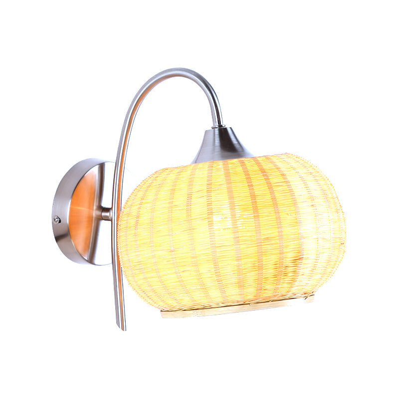 Rattan Rounded Drum Sconce Wall Light Modern Style 1 Light Chrome Finish Wall Lamp with Metal Curved Arm Clearhalo 'Wall Lamps & Sconces' 'Wall Lights' Lighting' 234592