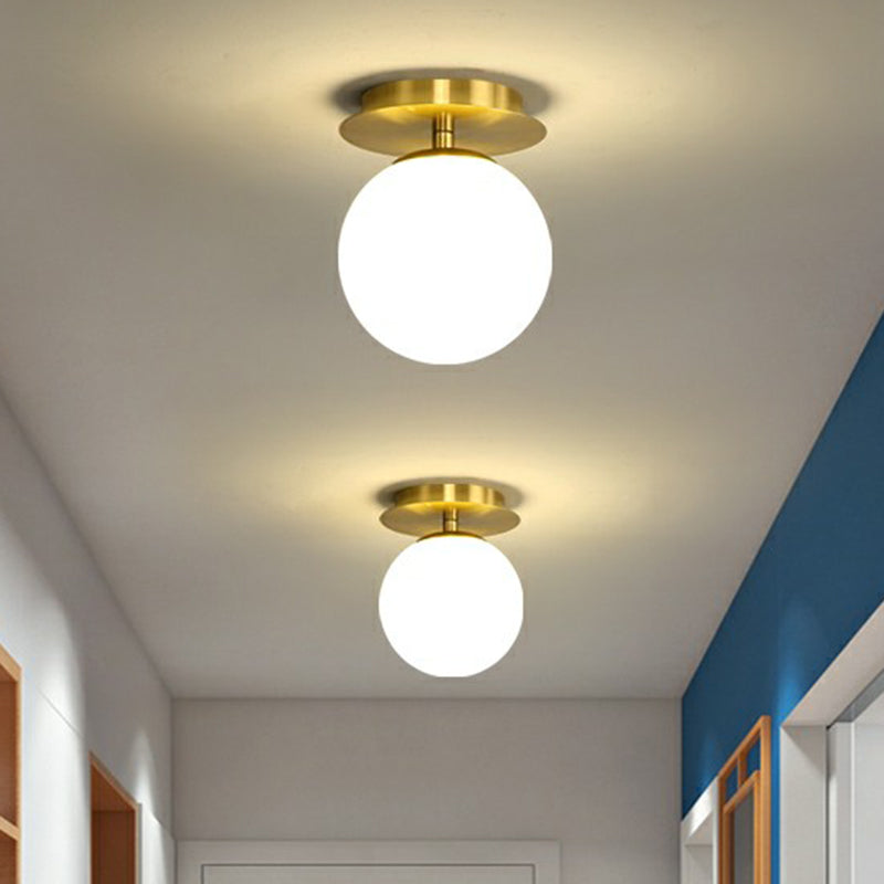 Ball Foyer Semi Flush Mount Lighting Glass 1-Light Postmodern Ceiling Light in Brass Clearhalo 'Ceiling Lights' 'Close To Ceiling Lights' 'Close to ceiling' 'Semi-flushmount' Lighting' 2353941
