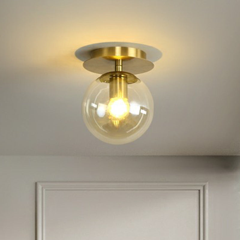 Ball Foyer Semi Flush Mount Lighting Glass 1-Light Postmodern Ceiling Light in Brass Clearhalo 'Ceiling Lights' 'Close To Ceiling Lights' 'Close to ceiling' 'Semi-flushmount' Lighting' 2353945