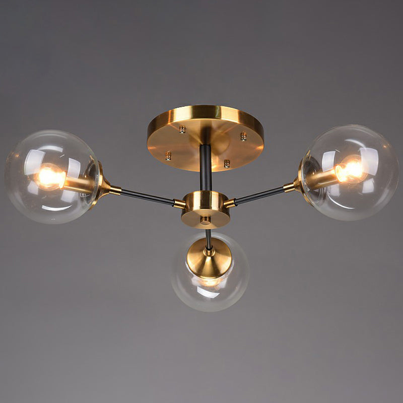 Black and Brass Radial Flush Mount Lighting Postmodern Metal Semi Flush Ceiling Light with Ball Glass Shade 3 Clear Clearhalo 'Ceiling Lights' 'Close To Ceiling Lights' 'Close to ceiling' 'Semi-flushmount' Lighting' 2354111