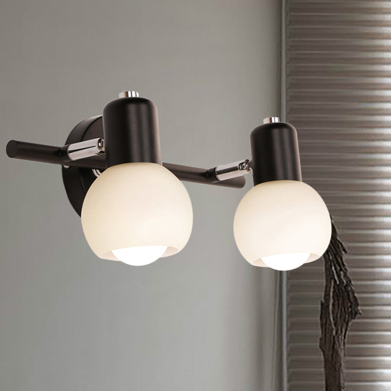 Globe Living Room Vanity Sconce Light Metal and Milk Glass 2/3 Lights Contemporary Wall Light Fixture in Black Clearhalo 'Cast Iron' 'Glass' 'Industrial' 'Modern wall lights' 'Modern' 'Tiffany' 'Traditional wall lights' 'Vanity Lights' 'Wall Lights' Lighting' 236577