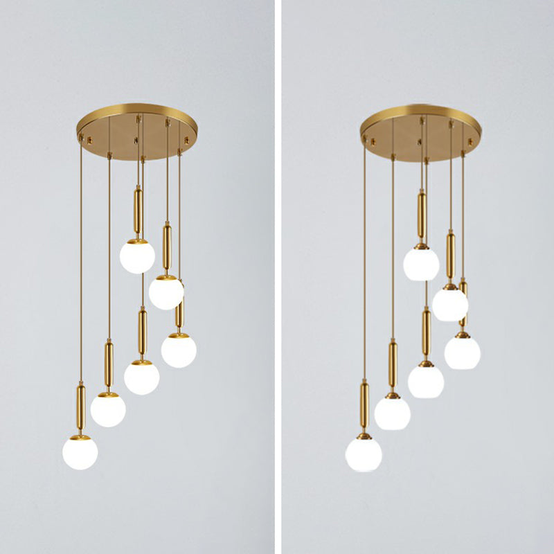 Minimalist Ball Pendant Lighting White Glass Stairway Multi Hanging Light Fixture in Gold Clearhalo 'Art Deco Pendants' 'Cast Iron' 'Ceiling Lights' 'Ceramic' 'Crystal' 'Industrial Pendants' 'Industrial' 'Metal' 'Middle Century Pendants' 'Modern Pendants' 'Modern' 'Pendant Lights' 'Pendants' 'Tiffany' Lighting' 2385135