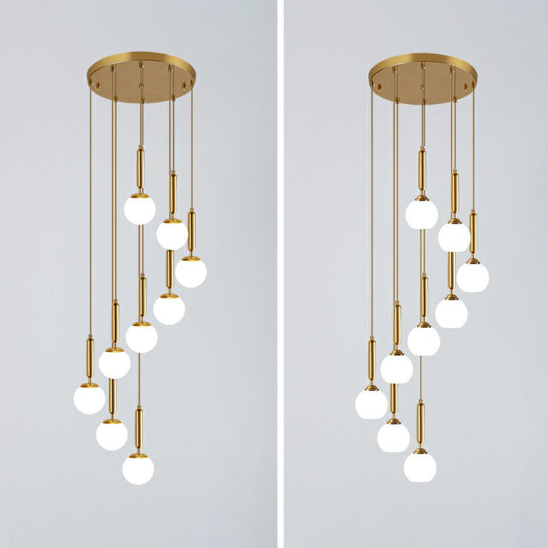 Minimalist Ball Pendant Lighting White Glass Stairway Multi Hanging Light Fixture in Gold Clearhalo 'Art Deco Pendants' 'Cast Iron' 'Ceiling Lights' 'Ceramic' 'Crystal' 'Industrial Pendants' 'Industrial' 'Metal' 'Middle Century Pendants' 'Modern Pendants' 'Modern' 'Pendant Lights' 'Pendants' 'Tiffany' Lighting' 2385136