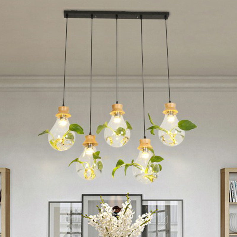 Hydroponic Plant Pendant Lamp Nordic Teardrop Shaped Clear Glass Suspension Light in Black Clearhalo 'Art Deco Pendants' 'Black' 'Cast Iron' 'Ceiling Lights' 'Ceramic' 'Crystal' 'Industrial Pendants' 'Industrial' 'Metal' 'Middle Century Pendants' 'Pendant Lights' 'Pendants' 'Rustic Pendants' 'Tiffany' Lighting' 2408626