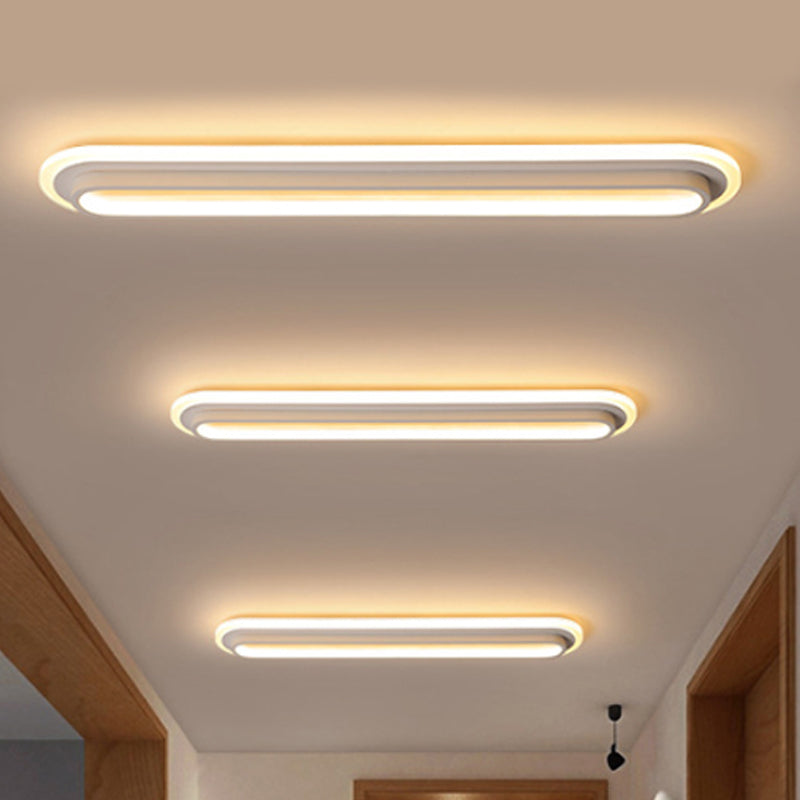 Oval Flush Ceiling Light Contemporary Metal LED Black/White Ceiling Light with Acrylic Diffuser in White/Warm Light, 19"/23"/31" Wide Clearhalo 'Ceiling Lights' 'Close To Ceiling Lights' 'Close to ceiling' 'Flush mount' Lighting' 241561