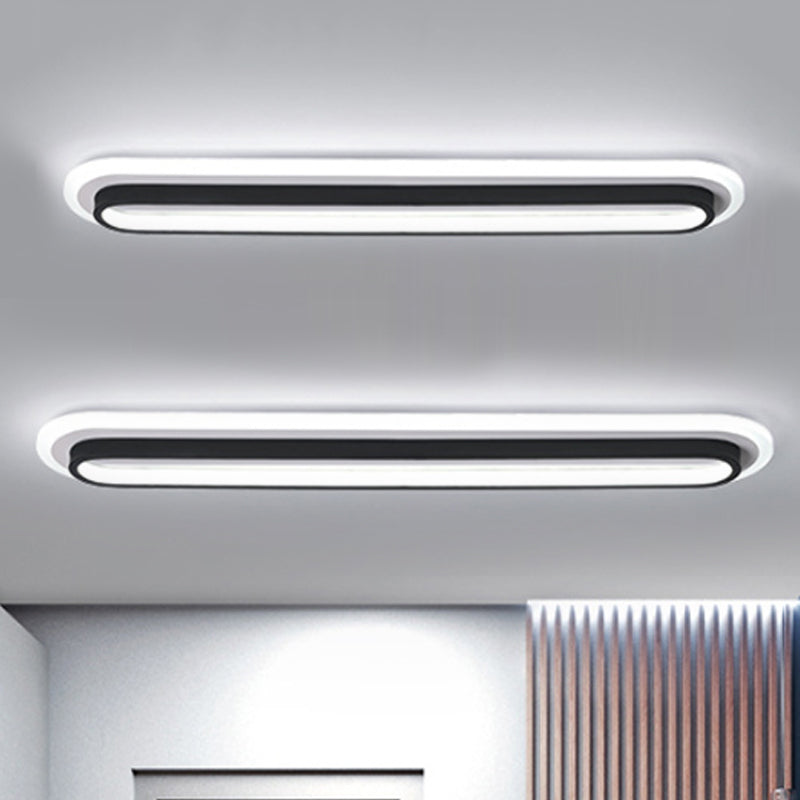 Oval Flush Ceiling Light Contemporary Metal LED Black/White Ceiling Light with Acrylic Diffuser in White/Warm Light, 19"/23"/31" Wide Black White Clearhalo 'Ceiling Lights' 'Close To Ceiling Lights' 'Close to ceiling' 'Flush mount' Lighting' 241563