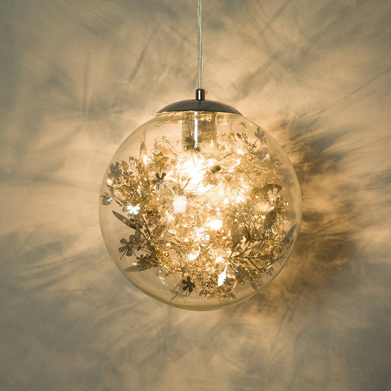 Globe Suspension Lighting Simple Clear Glass 1-Head Dining Room Pendant Light with Foil Flower Inside Silver Clearhalo 'Ceiling Lights' 'Close To Ceiling Lights' 'Glass shade' 'Glass' 'Modern Pendants' 'Modern' 'Pendant Lights' 'Pendants' Lighting' 2461752