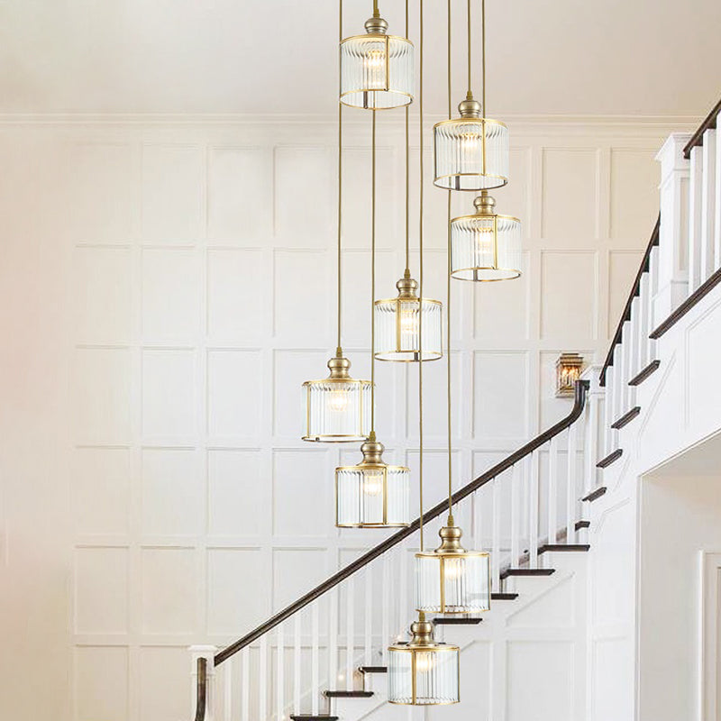 Brass Finish Cylinder Multiple Lamp Pendant Postmodern Ribbed Glass Hanging Light Fixture for Stairway Clearhalo 'Ceiling Lights' 'Modern Pendants' 'Modern' 'Pendant Lights' 'Pendants' Lighting' 2461945