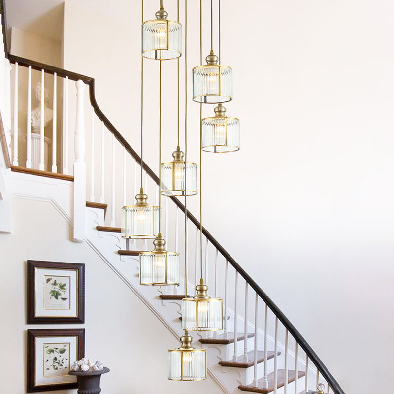 Brass Finish Cylinder Multiple Lamp Pendant Postmodern Ribbed Glass Hanging Light Fixture for Stairway Clearhalo 'Ceiling Lights' 'Modern Pendants' 'Modern' 'Pendant Lights' 'Pendants' Lighting' 2461948