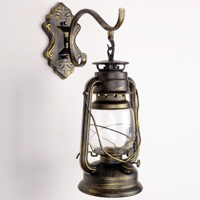 Single-Bulb Oil Lantern Sconce Antique Style Clear Glass Wall Mount Light Fixture for Aisle Bronze Curved Clearhalo 'Art deco wall lights' 'Cast Iron' 'Glass' 'Industrial wall lights' 'Industrial' 'Middle century wall lights' 'Modern' 'Rustic wall lights' 'Tiffany' 'Traditional wall lights' 'Wall Lamps & Sconces' 'Wall Lights' Lighting' 2465718