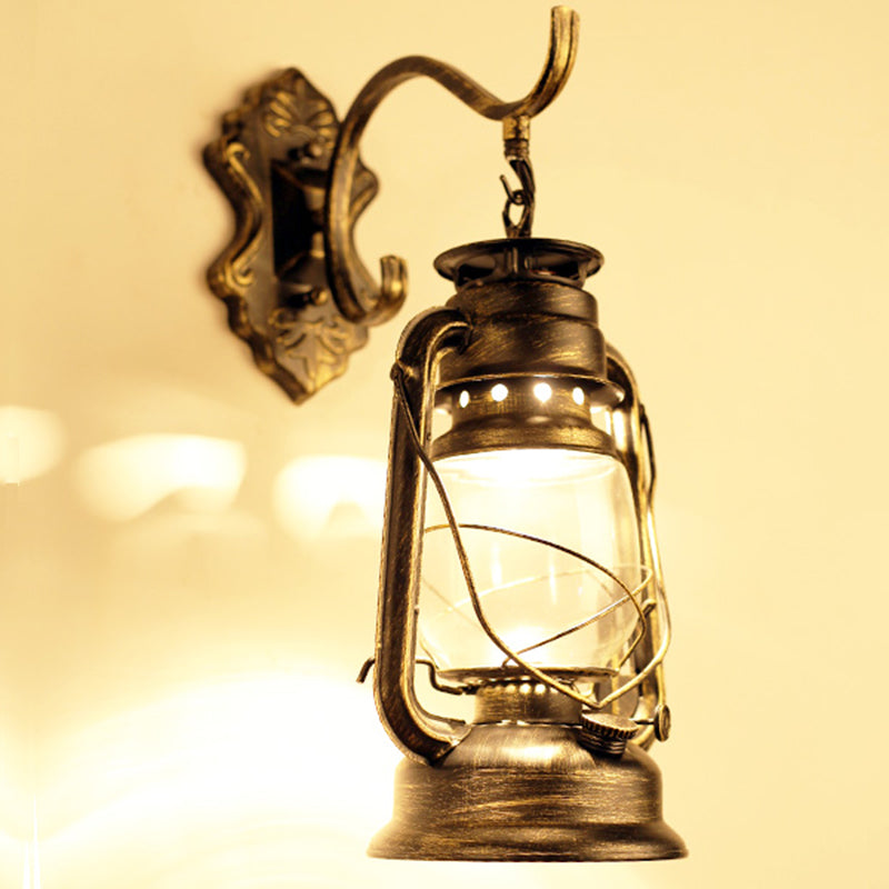 Single-Bulb Oil Lantern Sconce Antique Style Clear Glass Wall Mount Light Fixture for Aisle Clearhalo 'Art deco wall lights' 'Cast Iron' 'Glass' 'Industrial wall lights' 'Industrial' 'Middle century wall lights' 'Modern' 'Rustic wall lights' 'Tiffany' 'Traditional wall lights' 'Wall Lamps & Sconces' 'Wall Lights' Lighting' 2465724