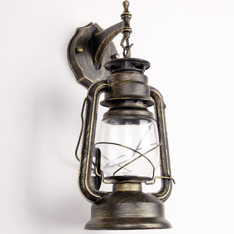 Single-Bulb Oil Lantern Sconce Antique Style Clear Glass Wall Mount Light Fixture for Aisle Bronze Straight Clearhalo 'Art deco wall lights' 'Cast Iron' 'Glass' 'Industrial wall lights' 'Industrial' 'Middle century wall lights' 'Modern' 'Rustic wall lights' 'Tiffany' 'Traditional wall lights' 'Wall Lamps & Sconces' 'Wall Lights' Lighting' 2465728