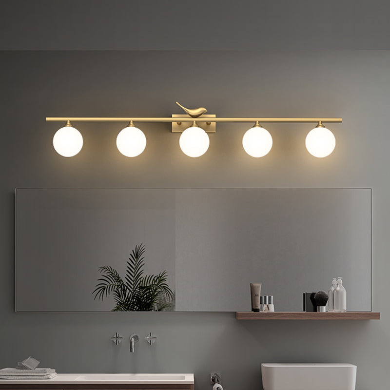 Ball Bathroom Vanity Sconce Opal Glass Postmodern Wall Light with Bird Decor in Brass Clearhalo 'Cast Iron' 'Glass' 'Industrial' 'Modern wall lights' 'Modern' 'Tiffany' 'Traditional wall lights' 'Vanity Lights' 'Wall Lights' Lighting' 2467201