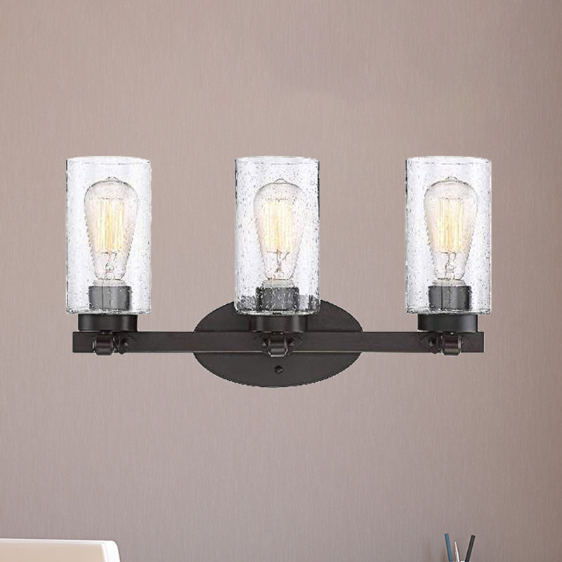 3-Bulb Seeded Glass Sconce Light Fixture Industrial Black Cylinder Dining Room Wall Lamp in Clear Clear Clearhalo 'Cast Iron' 'Glass' 'Industrial wall lights' 'Industrial' 'Middle century wall lights' 'Modern' 'Tiffany' 'Traditional wall lights' 'Wall Lamps & Sconces' 'Wall Lights' Lighting' 254079