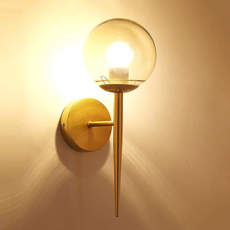 Black/Gold Round Wall Lighting Modern Clear Glass 1 Light Bedroom Sconce Light Fixture Clearhalo 'Cast Iron' 'Glass' 'Industrial wall lights' 'Industrial' 'Middle century wall lights' 'Modern' 'Tiffany' 'Traditional wall lights' 'Wall Lamps & Sconces' 'Wall Lights' Lighting' 256079