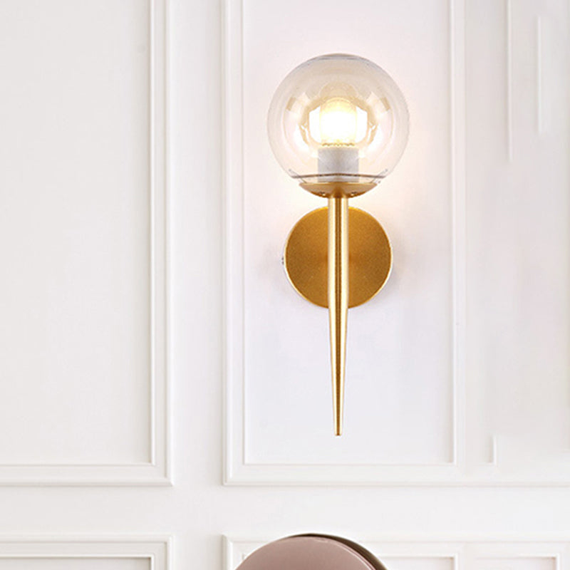 Black/Gold Round Wall Lighting Modern Clear Glass 1 Light Bedroom Sconce Light Fixture Clearhalo 'Cast Iron' 'Glass' 'Industrial wall lights' 'Industrial' 'Middle century wall lights' 'Modern' 'Tiffany' 'Traditional wall lights' 'Wall Lamps & Sconces' 'Wall Lights' Lighting' 256080