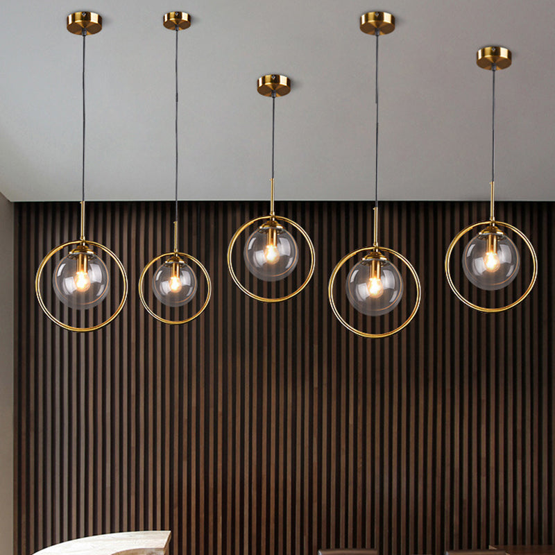 Mid-Century Design Globe Hanging Lamp Glass Shade with Metal Ring For Bedroom Clearhalo 'Ceiling Lights' 'Glass shade' 'Glass' 'Modern Pendants' 'Modern' 'Pendant Lights' 'Pendants' Lighting' 2579310