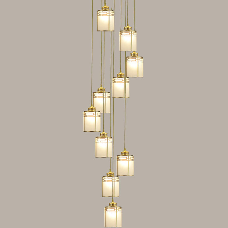 Frosted White Glass Cylindrical Pendant Lamp Modern Brass Multiple Hanging Lights for Duplex House 10 Brass Clearhalo 'Ceiling Lights' 'Glass shade' 'Glass' 'Modern Pendants' 'Modern' 'Pendant Lights' 'Pendants' Lighting' 2592903