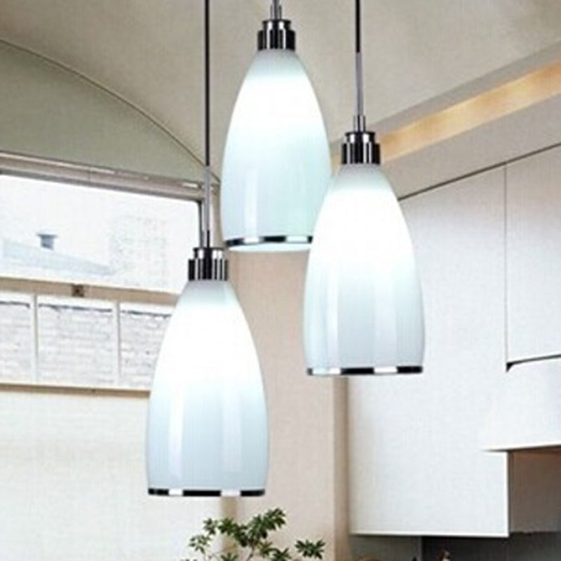 Satin Opal Glass Cluster Bell Pendant Minimalist 3-Light Chrome Suspension Light for Dining Room Clearhalo 'Ceiling Lights' 'Modern Pendants' 'Modern' 'Pendant Lights' 'Pendants' Lighting' 2593023