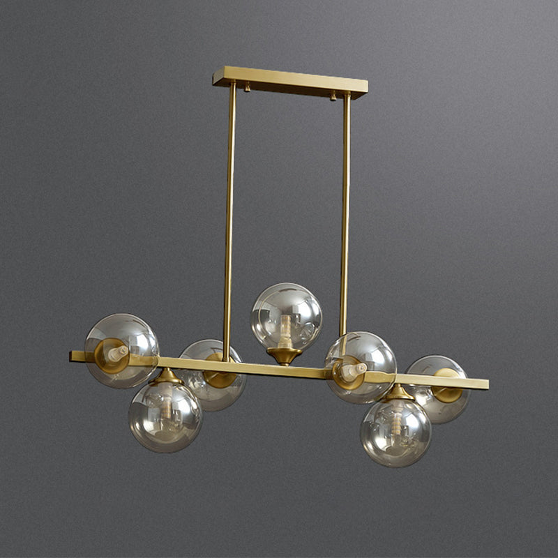 Mid-Century Modern Gold Metal Island Pendant Lighting Spherical Amber Glass Island Ceiling Light for Dining Table Clearhalo 'Ceiling Lights' 'Island Lights' 'Lighting' 2605094
