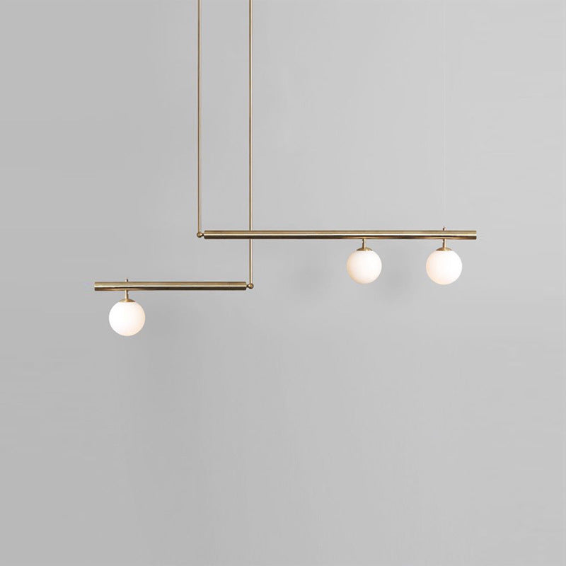Modern Minimalism Gold Metal Linear Island Pendant Lighting Globe Glass Island Ceiling Light for Living Room Clearhalo 'Ceiling Lights' 'Island Lights' 'Lighting' 2605259