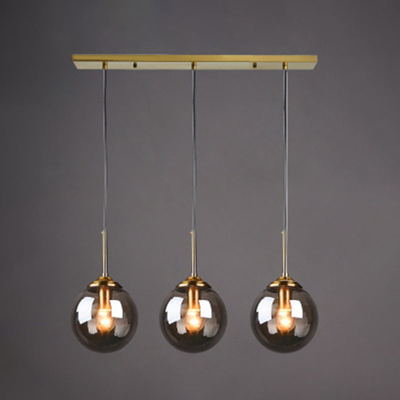 3 Lights Globe Hanging Ceiling Lights Minimalist Glass Multi Light Pendant for Restaurant Smoke Gray Linear Clearhalo 'Ceiling Lights' 'Pendant Lights' 'Pendants' Lighting' 2630012_1e64f950-835d-484a-9a43-269e912c979a
