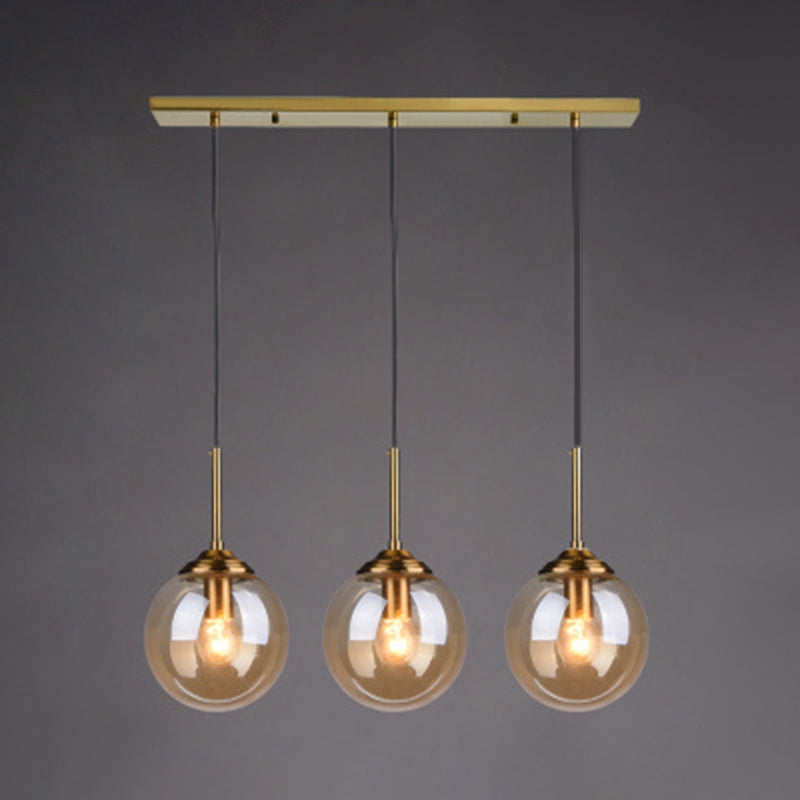 3 Lights Globe Hanging Ceiling Lights Minimalist Glass Multi Light Pendant for Restaurant Clearhalo 'Ceiling Lights' 'Pendant Lights' 'Pendants' Lighting' 2630014