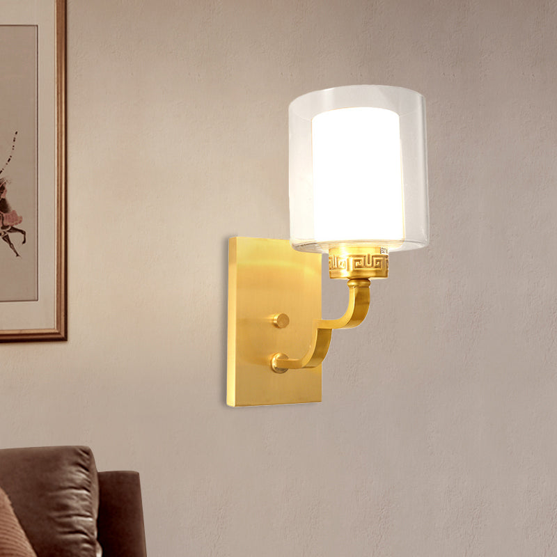 1 Head Wall Lighting with Cylinder Shade Clear and White Glass Modern Style Bedroom Wall Sconce in Brass Clearhalo 'Wall Lamps & Sconces' 'Wall Lights' Lighting' 273840