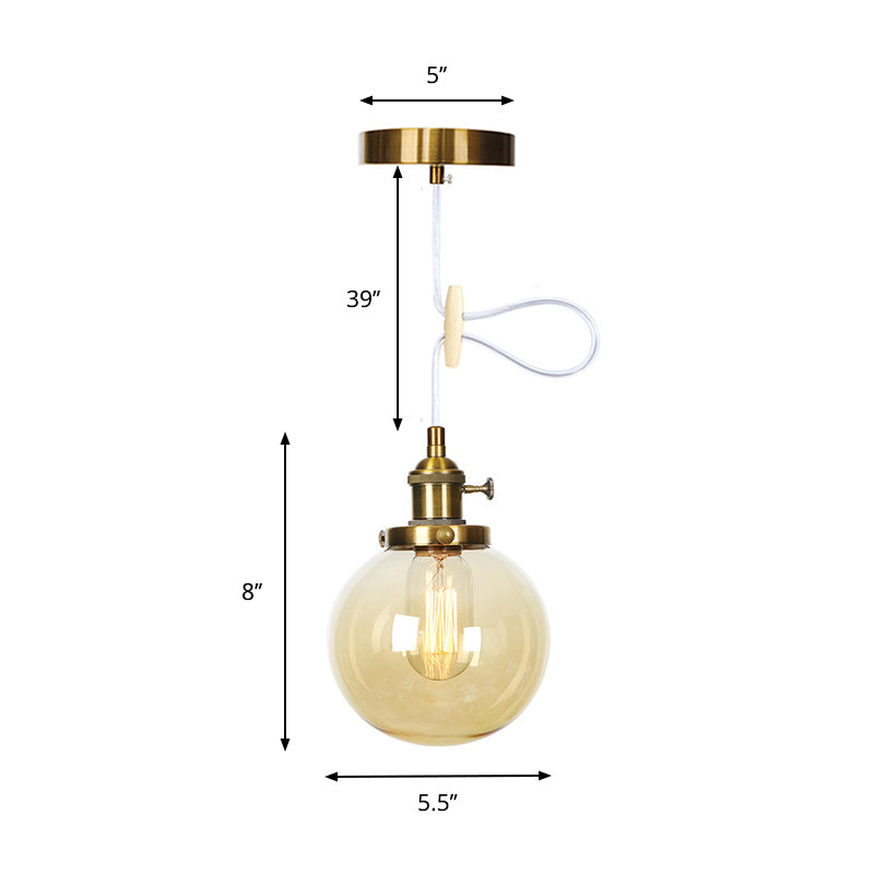 Orbit Hanging Lighting Farmhouse Amber/Clear Glass 1 Bulb Pendant Light Fixture with Adjustable Cord in Black/Bronze/Brass Finish Clearhalo 'Art Deco Pendants' 'Black' 'Cast Iron' 'Ceiling Lights' 'Ceramic' 'Crystal' 'Industrial Pendants' 'Industrial' 'Metal' 'Middle Century Pendants' 'Pendant Lights' 'Pendants' 'Rustic Pendants' 'Tiffany' Lighting' 273920