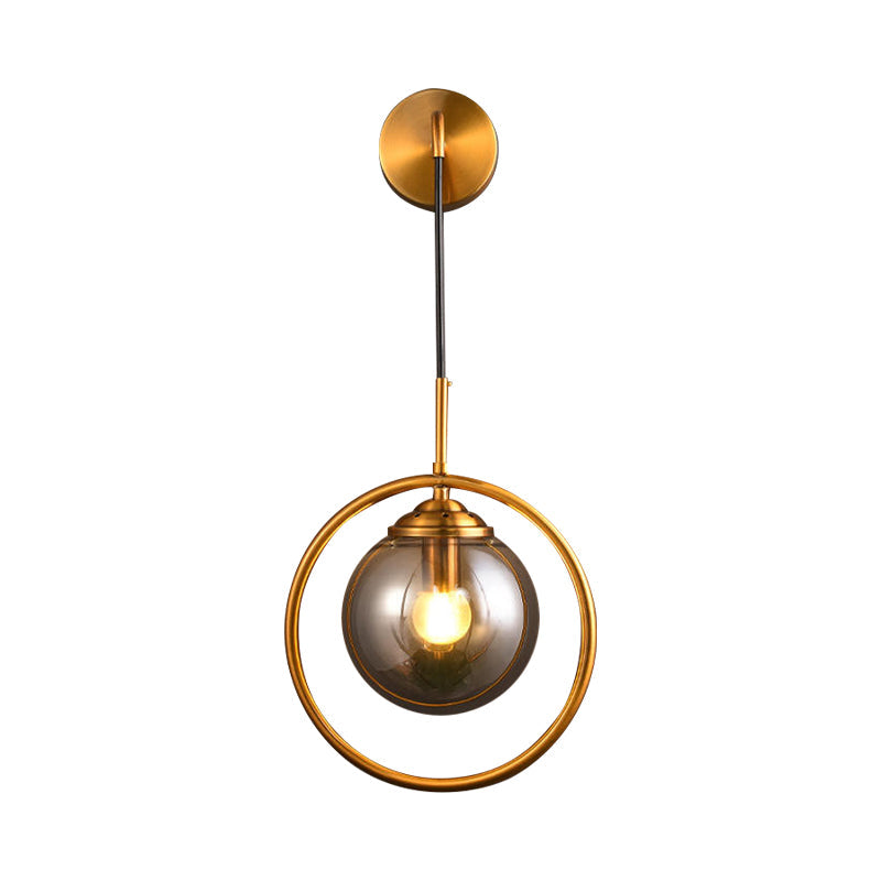 Orbit Smoke Gray/Clear/Amber Glass Wall Lamp Contemporary Single Brass Finish Sconce Light Fixture Clearhalo 'Cast Iron' 'Glass' 'Industrial' 'Modern wall lights' 'Modern' 'Tiffany' 'Traditional wall lights' 'Wall Lamps & Sconces' 'Wall Lights' Lighting' 274475