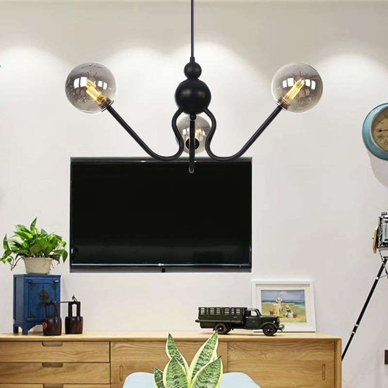 Industrial 3 Heads Hanging Chandelier Lamp with Amber/Clear Glass Shade Black/Chrome Finish Orbit Ceiling Lighting Clearhalo 'Cast Iron' 'Ceiling Lights' 'Chandeliers' 'Industrial Chandeliers' 'Industrial' 'Metal' 'Middle Century Chandeliers' 'Rustic Chandeliers' 'Tiffany' Lighting' 281238