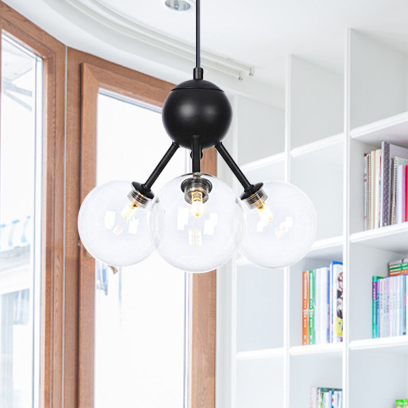 Orb Living Room Chandelier Lamp Amber/Clear/Smoke Gray Glass 3/9/12 Lights Industrial Ceiling Light with Sputnik Design, 13"/27.5"/34" Wide 3 Clear 13" Clearhalo 'Cast Iron' 'Ceiling Lights' 'Chandeliers' 'Clear' 'Industrial Chandeliers' 'Industrial' 'Metal' 'Middle Century Chandeliers' 'Modern' 'Rustic Chandeliers' 'Tiffany' 'Traditional Chandeliers' Lighting' 282360