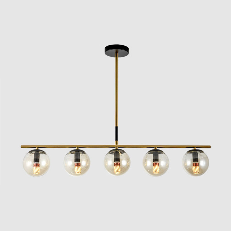 Globe Shaped White/Smoke Grey/Clear Glass Island Chandelier Minimalist 4/5 Lights Brass Pendant Lighting 5 Amber Clearhalo 'Ceiling Lights' 'Glass shade' 'Glass' 'Island Lights' Lighting' 311161
