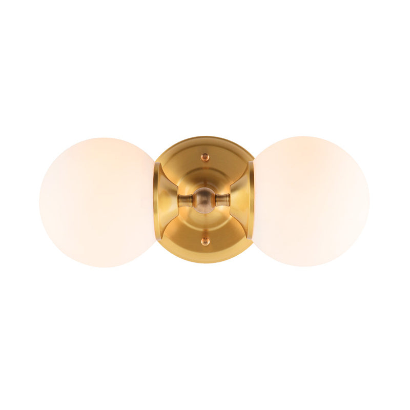 Spherical Sconce Contemporary Milky Glass 2 Heads Wall Mount Light Fixture in Brass Clearhalo 'Cast Iron' 'Glass' 'Industrial' 'Modern wall lights' 'Modern' 'Tiffany' 'Traditional wall lights' 'Wall Lamps & Sconces' 'Wall Lights' Lighting' 324228