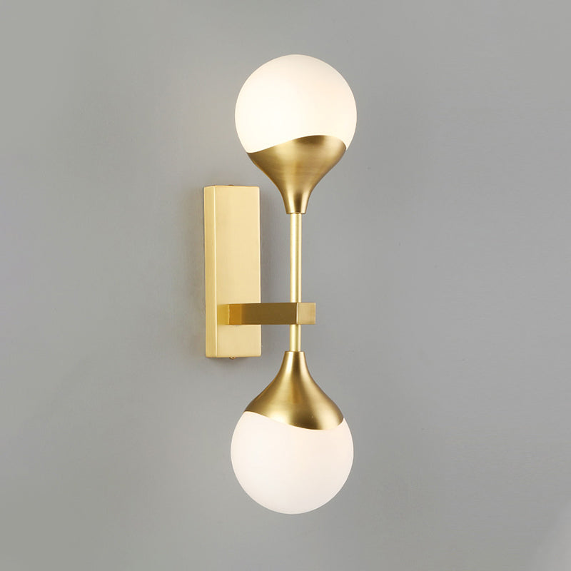 Modernist 2 Heads Wall Lighting Brass Global Sconce Light Fixture with Opal Glass Shade Clearhalo 'Cast Iron' 'Glass' 'Industrial' 'Modern wall lights' 'Modern' 'Tiffany' 'Traditional wall lights' 'Wall Lamps & Sconces' 'Wall Lights' Lighting' 324237