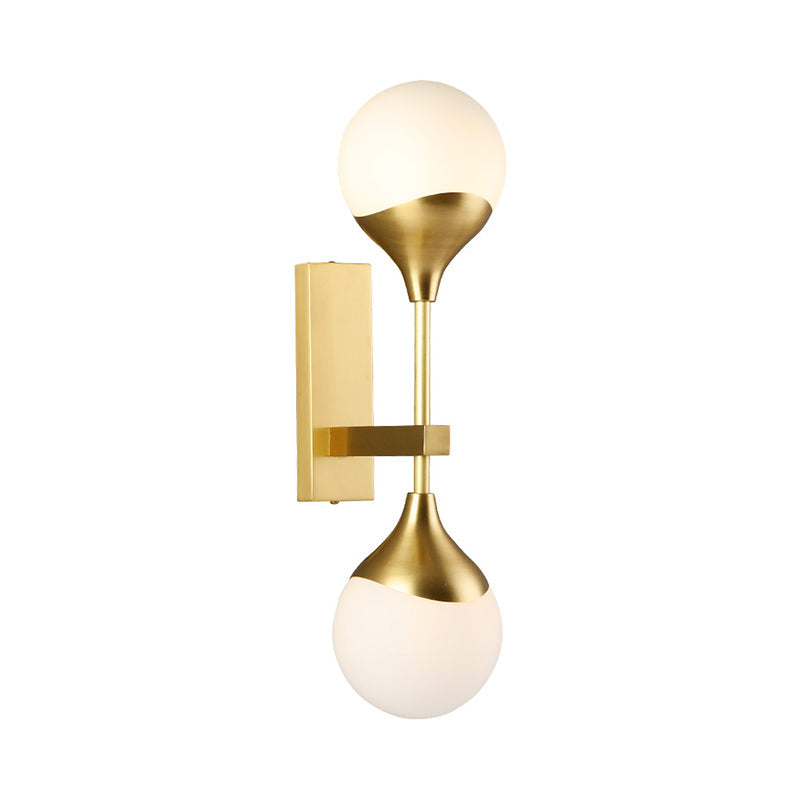 Modernist 2 Heads Wall Lighting Brass Global Sconce Light Fixture with Opal Glass Shade Clearhalo 'Cast Iron' 'Glass' 'Industrial' 'Modern wall lights' 'Modern' 'Tiffany' 'Traditional wall lights' 'Wall Lamps & Sconces' 'Wall Lights' Lighting' 324238