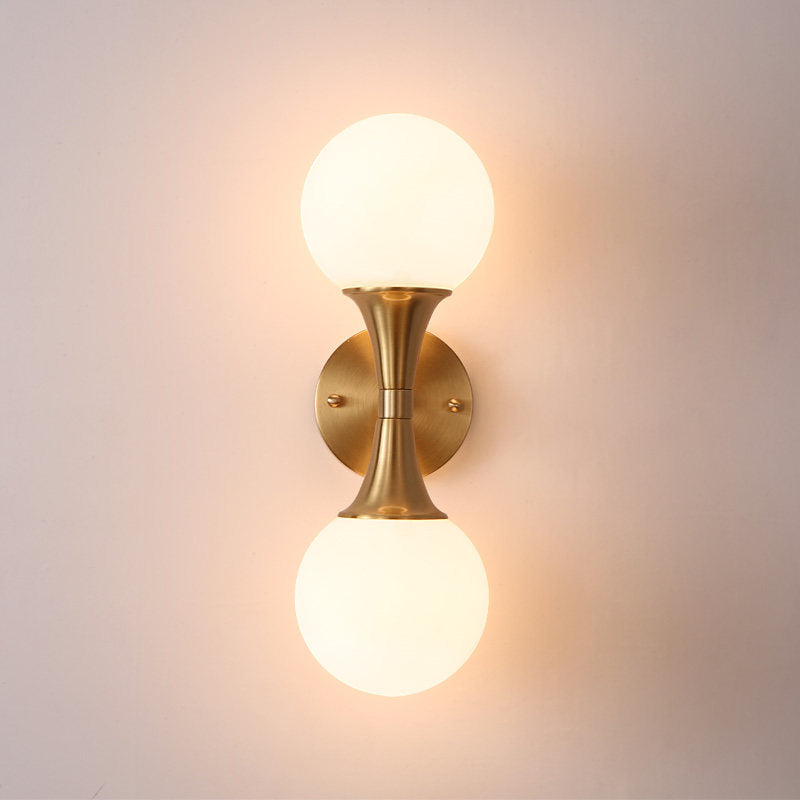 2 Bulbs Bathroom Vanity Light Modernism Brass Wall Mounted Lamp with Orb Milky Glass Shade Clearhalo 'Cast Iron' 'Glass' 'Industrial' 'Modern wall lights' 'Modern' 'Tiffany' 'Traditional wall lights' 'Wall Lamps & Sconces' 'Wall Lights' Lighting' 325929