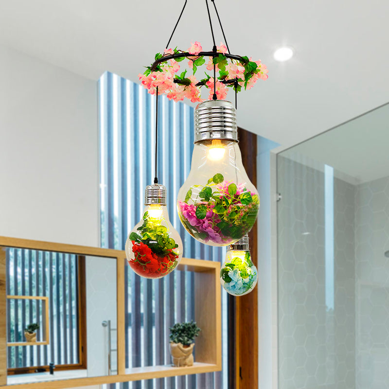 Clear Glass Bulb Cluster Pendant Industrial 3 Lights Restaurant LED Ceiling Lamp in Black with Flower Decoration Black A Clearhalo 'Ceiling Lights' 'Glass shade' 'Glass' 'Industrial Pendants' 'Industrial' 'Middle Century Pendants' 'Pendant Lights' 'Pendants' 'Tiffany' Lighting' 400990