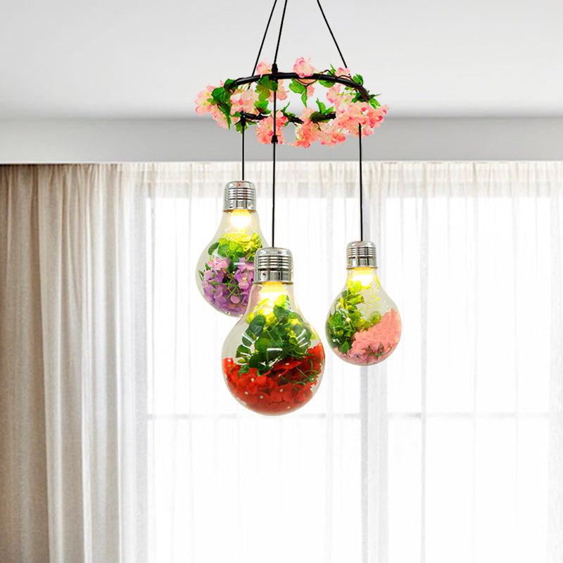 Clear Glass Bulb Cluster Pendant Industrial 3 Lights Restaurant LED Ceiling Lamp in Black with Flower Decoration Black C Clearhalo 'Ceiling Lights' 'Glass shade' 'Glass' 'Industrial Pendants' 'Industrial' 'Middle Century Pendants' 'Pendant Lights' 'Pendants' 'Tiffany' Lighting' 401003