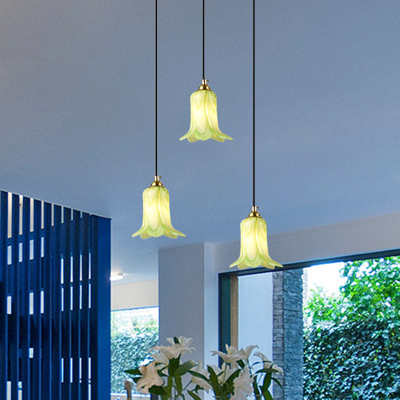 Romantic Pastoral Lily Cluster Pendant 3 Bulbs White/Green/Purple Glass LED Ceiling Hang Fixture for Foyer Clearhalo 'Ceiling Lights' 'Chandeliers' 'Glass shade' 'Glass' 'Pendant Lights' 'Pendants' Lighting' 401565