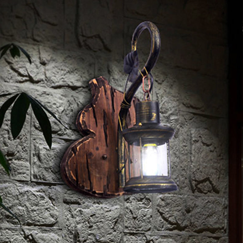 Coastal Lantern Wall Lighting Fixture 1 Bulb Clear Glass Sconce Light in Antique Brass with Gourd Backplate Clearhalo 'Industrial wall lights' 'Industrial' 'Middle century wall lights' 'Rustic wall lights' 'Tiffany' 'Wall Lamps & Sconces' 'Wall Lights' Lighting' 467067