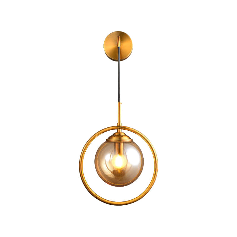Metal Ring Sconce Lighting Modern 1-Bulb Brass Wall Mounted Lamp with Sphere Tan Glass Shade for Bedside Clearhalo 'Cast Iron' 'Glass' 'Industrial' 'Modern wall lights' 'Modern' 'Tiffany' 'Traditional wall lights' 'Wall Lamps & Sconces' 'Wall Lights' Lighting' 513012