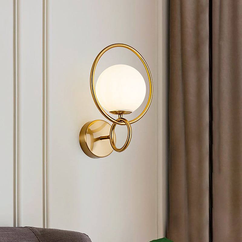 Ring Iron Wall Mount Lighting Post Modern 1-Bulb Brass Finish Wall Lamp Sconce with Ball Opal Glass Shade Clearhalo 'Cast Iron' 'Glass' 'Industrial' 'Modern wall lights' 'Modern' 'Tiffany' 'Traditional wall lights' 'Wall Lamps & Sconces' 'Wall Lights' Lighting' 520727