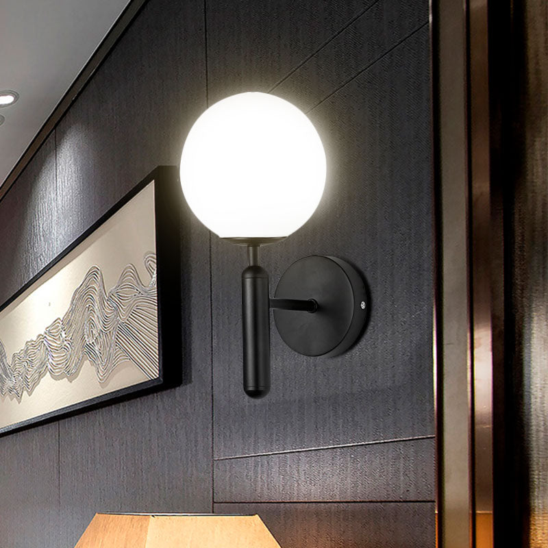 1 Light Clear Textured Glass Wall Sconce Light Modern Black Globe Bedroom Lighting Fixture Clear Clearhalo 'Cast Iron' 'Glass' 'Industrial wall lights' 'Industrial' 'Middle century wall lights' 'Modern' 'Tiffany' 'Traditional wall lights' 'Wall Lamps & Sconces' 'Wall Lights' Lighting' 598098