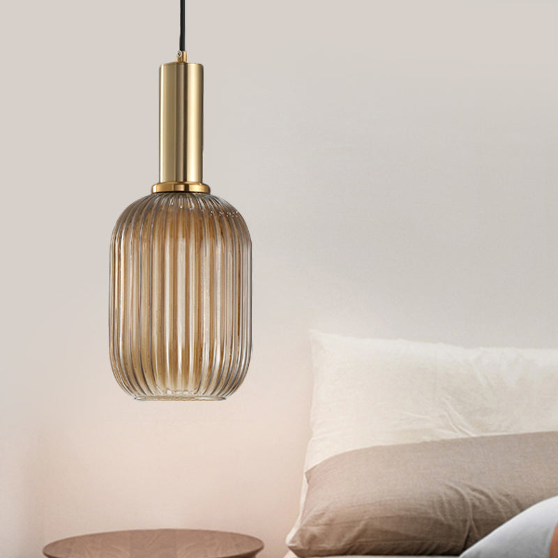 Black/Gold Cylinder/Oval/Capsule Pendant Lamp Modernist 1 Light Grey/Green/Amber Ribbed Glass Ceiling Light Fixture for Kitchen Gold Amber Capsule Clearhalo 'Ceiling Lights' 'Glass shade' 'Glass' 'Modern Pendants' 'Modern' 'Pendant Lights' 'Pendants' Lighting' 598297