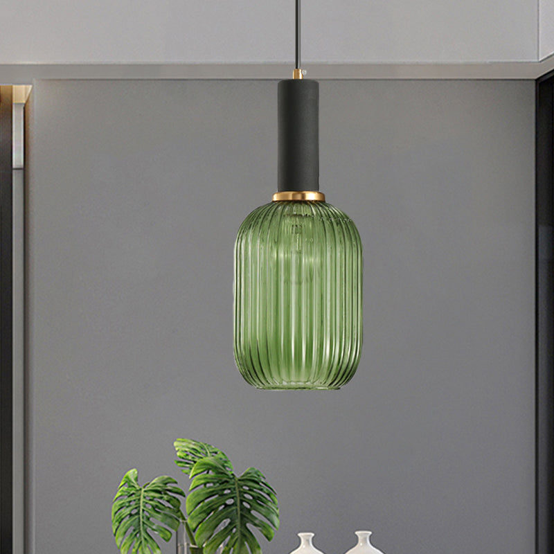 Black/Gold Cylinder/Oval/Capsule Pendant Lamp Modernist 1 Light Grey/Green/Amber Ribbed Glass Ceiling Light Fixture for Kitchen Black Green Capsule Clearhalo 'Ceiling Lights' 'Glass shade' 'Glass' 'Modern Pendants' 'Modern' 'Pendant Lights' 'Pendants' Lighting' 598301