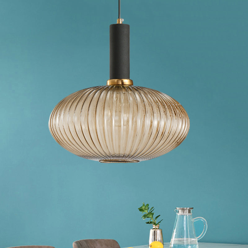 Black/Gold Cylinder/Oval/Capsule Pendant Lamp Modernist 1 Light Grey/Green/Amber Ribbed Glass Ceiling Light Fixture for Kitchen Black Amber Oval Clearhalo 'Ceiling Lights' 'Glass shade' 'Glass' 'Modern Pendants' 'Modern' 'Pendant Lights' 'Pendants' Lighting' 598362